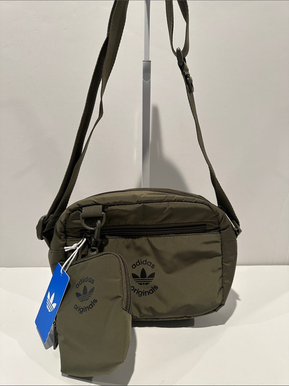 NWT Adidas Olive Green Puffer and Pouch Crossbody Bag with inside zipper pocket.